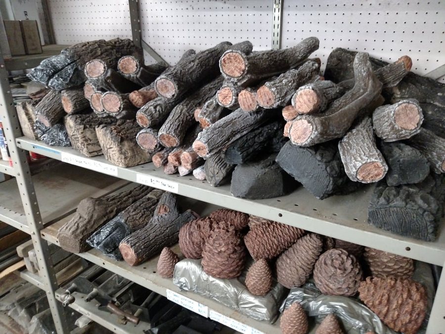 Shelves of ceramic gas log sets at the Mesa store